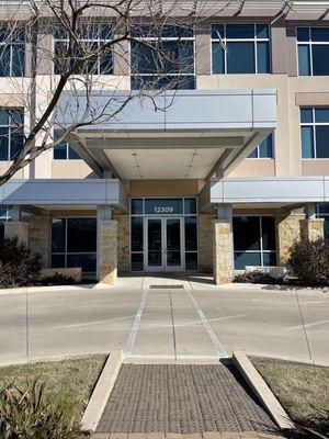 Exterior entrance facing P. Terry's on Cedar Bend, across from St. David's North Austin Medical Center