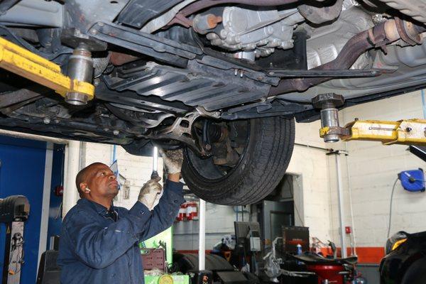 At Bobby's Auto collision & Repairs, we do all type of Mechanical work. In this above pic, mechanic is checking the car for NYS Inspection.