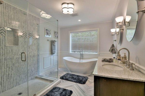 Master Bath with soaking tub, separate shower and heated marble tile floors