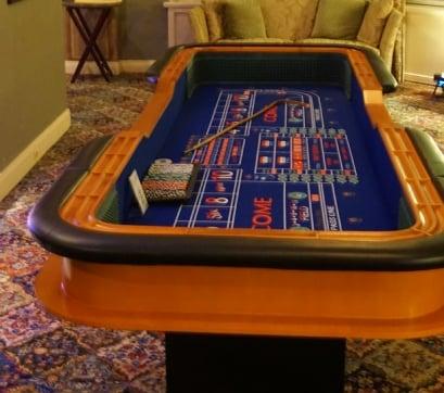 Craps - roll the Dice for a high energy game of chance. Our experienced dealers will engage your guests and help them learn the game.