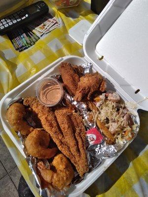 Land and sea sample.  Catfish , shrimp, chicken wings, and jambalaya fries