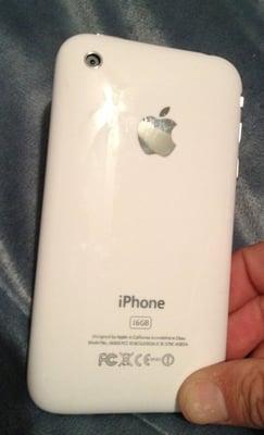 This is a fully restored all white iPhone.