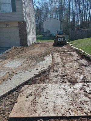 Dugout concrete and replace with stone.(driveway).