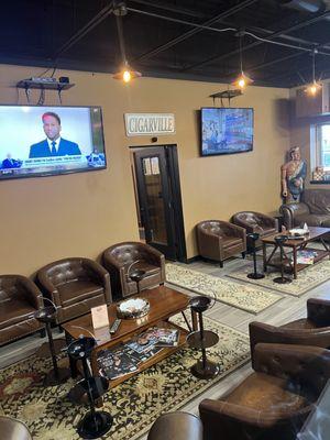 Buy a cigar from our humidor and enjoy our public lounge! 3 60" tvs & 20 chairs!