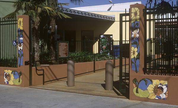 The entrance to Parque Ninos Unidos at 23rd St designed and fabricated by public artist Isis Rodriguez, San Francisco, CA