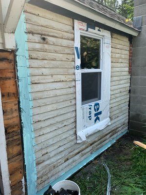 Replaced window, prepped for new siding.