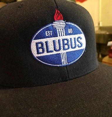 We do embroidery on all different types of clothing and hats. These are our employee hats.