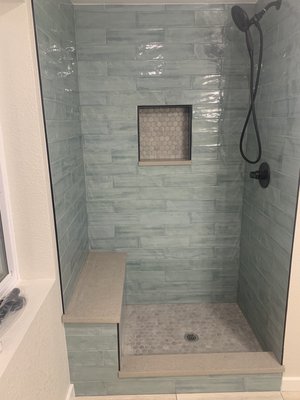 This was our shower before the glass and door was out in.