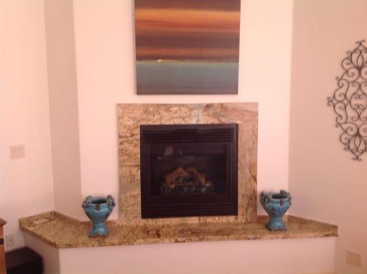 fireplace with granite surround