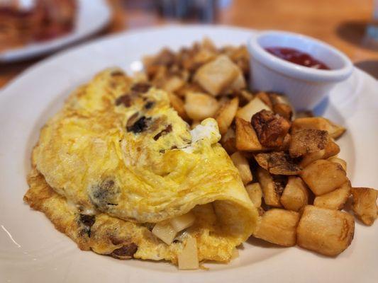 BYO Omelette -- sausage, mushrooms, and Swiss cheese