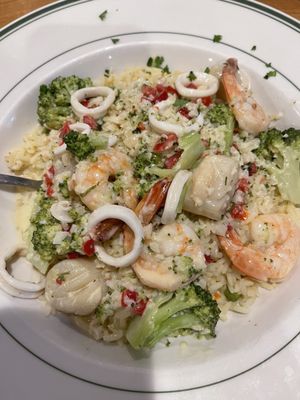 Seafood scampi, broccoli florets over rice or linguine.   Soup, salad and dessert