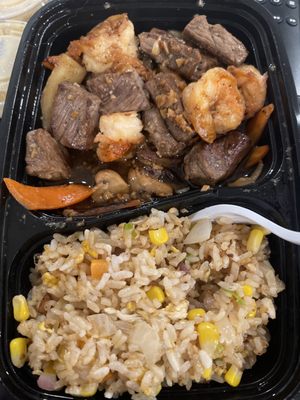 Shrimp and steak hibachi, but super dry and overcooked.