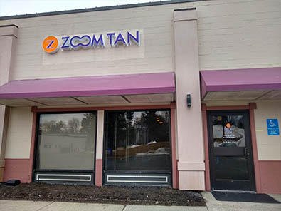 Zoom Tan Store Front