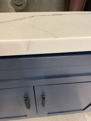 Paint coming off our cabinet that's only 1 month old!