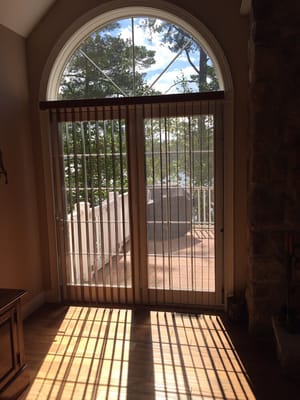 Lake home in East Wakefield. Signature Series Wood Verticals & Window Film to prevent Sun fading the floor.