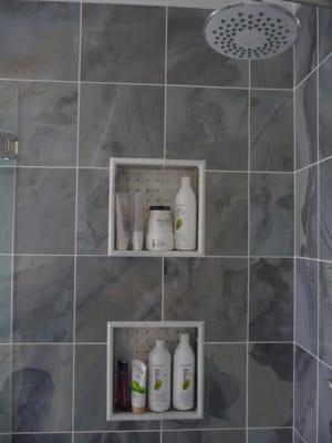 shelves in the glass shower - great to have for storing shampoo, etc. looks amazing