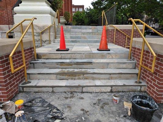 Process of restoring damaged stairs by skateboarders