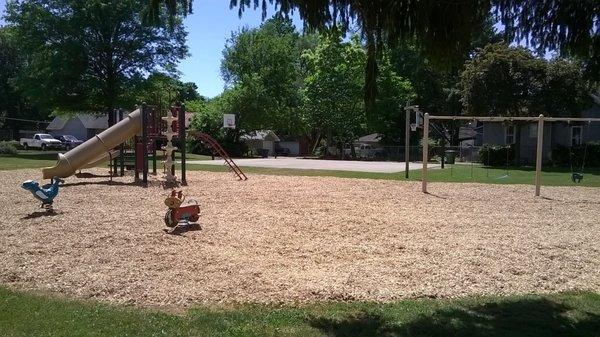 small playground and a basketball court