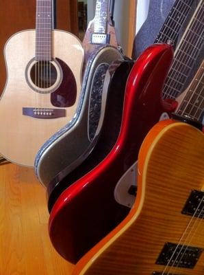 A few guitars in the studio.  They all sound different and get used for different tones and styles.