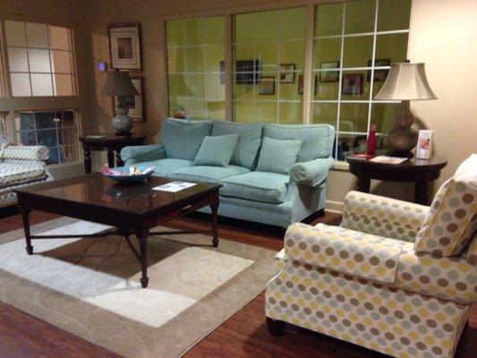 Family Room -- comfortable  (Window behind sofa provides view of playroom)