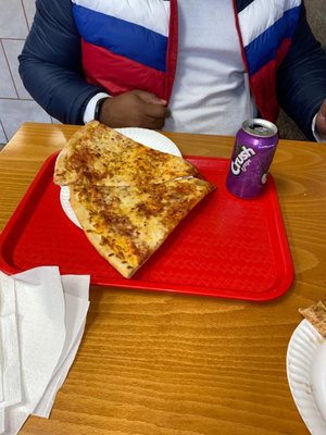 2 slices with a soda