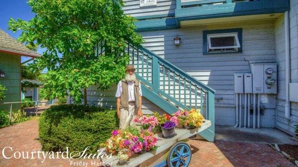 Our local flower vendor at the entrance to Courtyard Suites.