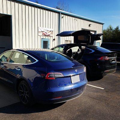 Tesla model 3. Tesla model x in for service