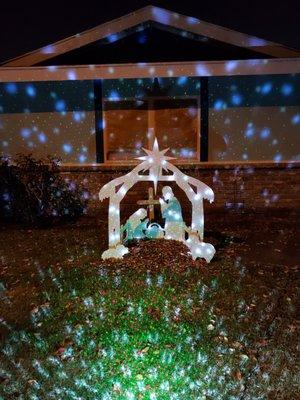 Our beautiful white Nativity with laser lights!