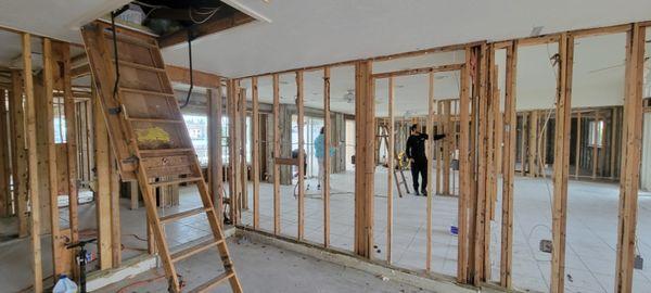 Complete wall to wall hurricane damage prep work. This entire first floor was completely underwater.