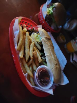 Cheesesteak sandwich with fries