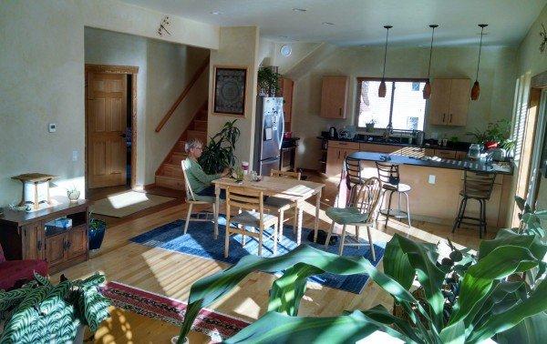 Sun streams into this passive solar home built with Faswall.   Interior walls are plastered directly on the surface of the faswall.