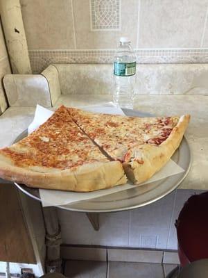 Jumbo slices.  On 3 bucks each.  Pretty tasty.  Quick and kind service