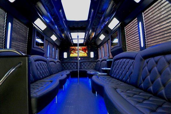 Our Legend Party Bus interior has 4 Flat Screen TV's, a large bar area, dance pole and top of the range sound / lighting systems