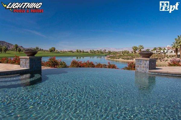 Here's a gorgeous infinity overflow pool design by NPT to inspire your design.  This one features NPT's Tuscany Pietra Azul pool tile and