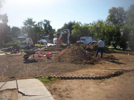 Part of the Plumbing Specialists, Inc. crew hard at work.