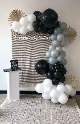 Photo backdrop with balloon garland