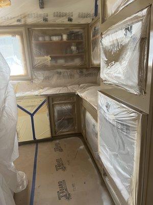 spraying cabinets!