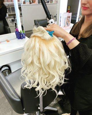 Curls on golden platinum blonde