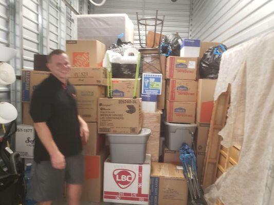 David and the neatly Tetris boxes he organized with Jovani at our storage site!!!