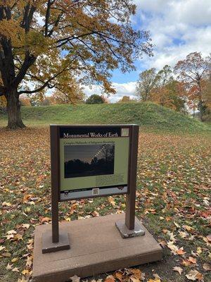 The mound in the distance is right at the opening of the large circular mound.  Info sign is about the Hopewell people.