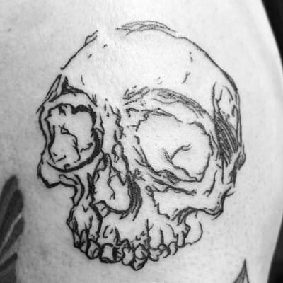 Skull tattoo by Maxine