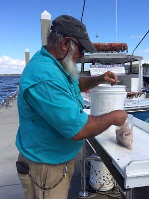 Capt Steve cleaning our fish