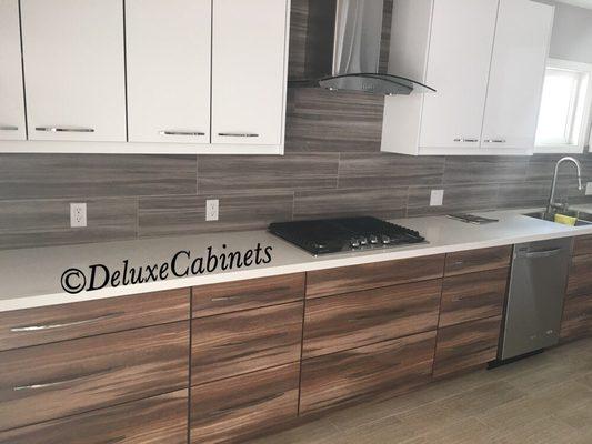 Modern kitchen done by Deluxe Cabinets.