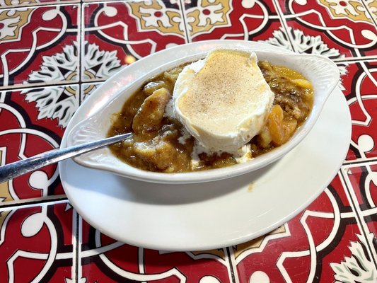 Peach Cobbler with a scoop of Bluebell icecream