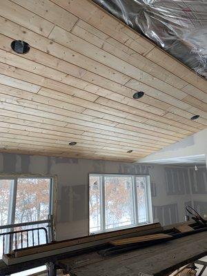 Tongue and groove on the ceiling of the cabin we are finishing.