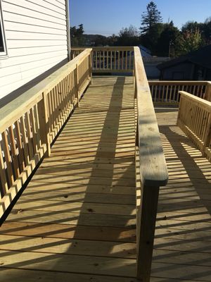 Handicap ramp with pressure treated decking and railing