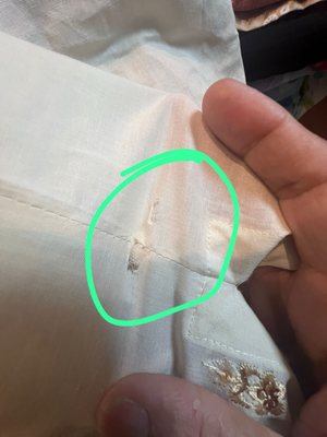 Holes on the kurta.