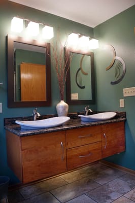 Cabinet built and hung in a bathroom remodeling project.