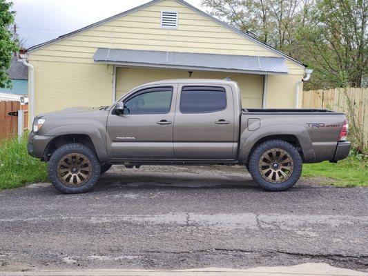 My Tacoma with his new shoes and leveled out!  Thanks HD and Mr. Remington!!