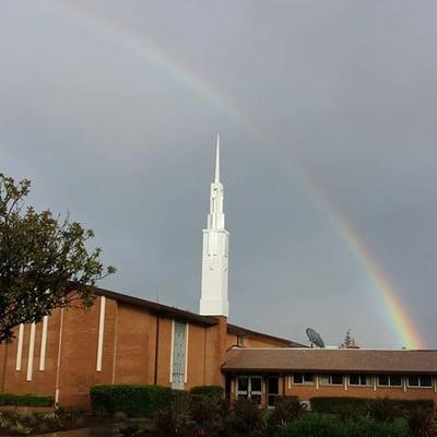 Rainbow over church after replacing new steeple.